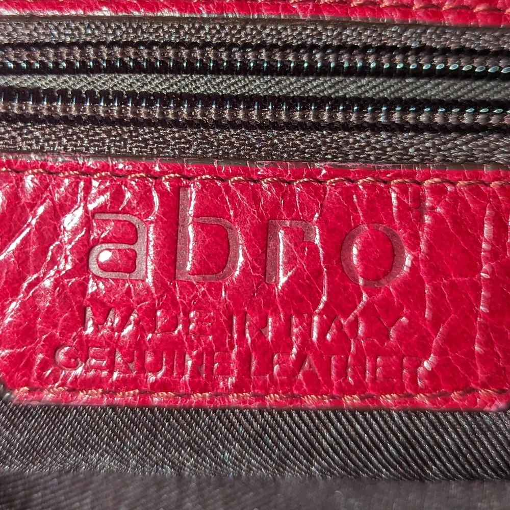 Abro burgundy red leather pleated details hobo bag.